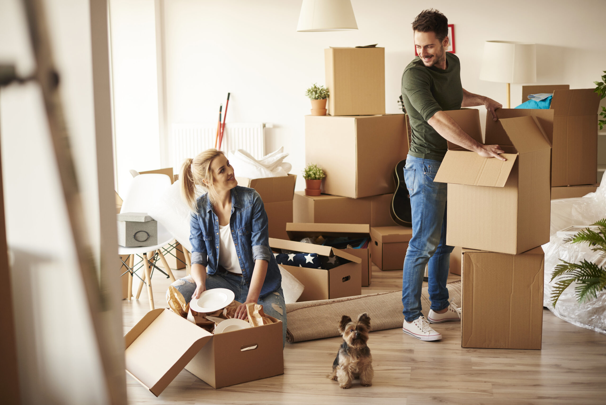 Couple moving into their new apartment.